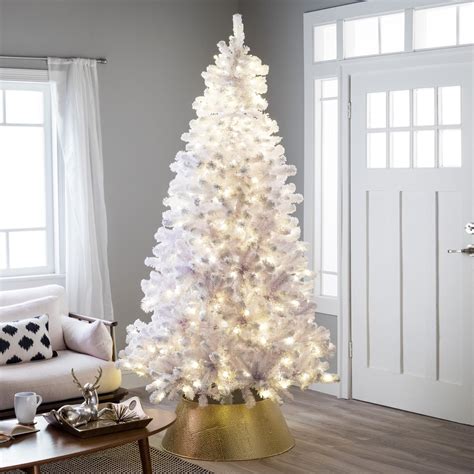 small white christmas tree with lights